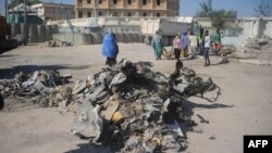 Wreckage of a car near Somalia's ministries of works and labor stormed by Al-Shabaab militants in Somalia's capital Mogadishu. (File)