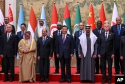 چین ۔ عرب فورم کے اجلاس سے قبل شرکا کا ایک گروپ فوٹو، رائٹرز 30 مئی 2024