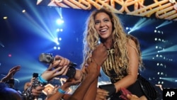 Singer Beyonce performs during her "Mrs. Carter Show World Tour 2013", June 29, 2013, in Las Vegas, Nevada. 