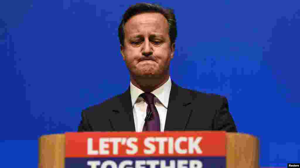 Britain's Prime Minister David Cameron gestures as he delivers a speech at the Aberdeen Exhibition and Conference Centre in Aberdeen, Scotland, Sept. 15, 2014. 