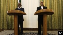 Iranian Foreign Minister Ali Akbar Salehi, right, speaks with media during a joint press conference with International envoy Kofi Annan, left, after their meeting in Tehran, Iran, July 10, 2012. 