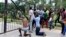 University of Zambia students "surrender" to police in Lusaka after the Zambian government announced the university's closure, Feb. 3, 2016.