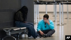 Colombian migrants deported from the United States sit inside El Dorado airport after their arrival in Bogota, Colombia, on Jan. 28, 2025. Venezuela will now receive undocumented migrants sent back from the U.S., President Donald Trump said on Feb. 1, 2025.