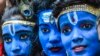 Students dressed up as Hindu gods Lord Krishna and Lord Shiva participate in a cultural event in their school in Mumbai, India.