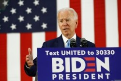 FILE - Democratic presidential candidate, former Vice President Joe Biden speaks at Alexis Dupont High School in Wilmington, Del., June 30, 2020.