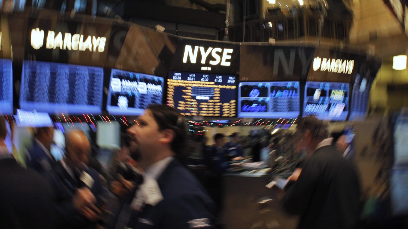 Traders work on the floor of the New York Stock Exchange in New York, December 26, 2012.