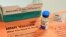 FILE PHOTO: A vial of measles, mumps and rubella vaccine and an information sheet is seen at Boston Children's Hospital in Boston