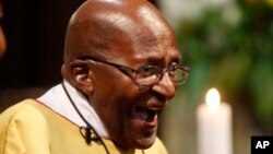 Anglican Archbishop Emeritus Desmond Tutu reacts during a church service at the St. George's Cathedral as he celebrates his 85th birthday in Cape Town, South Africa, Oct. 7, 2016.