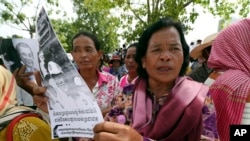 FILE - Farmers from some of provinces stage a protest rally near prime minister's residence in Phnom Penh, Cambodia, July 22, 2019.