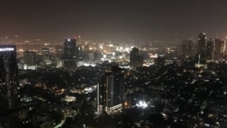 Bangkok's skyline is seen from one of the city's rooftops. A decision by Thailand’s Constitutional Court to ban the opposition Future Forward Party has dented optimism that democracy was returning to the military-run country.