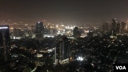 Bangkok's skyline is seen from one of the city's rooftops. A decision by Thailand’s Constitutional Court to ban the opposition Future Forward Party has dented optimism that democracy was returning to the military-run country.