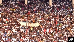 People attend a music concert at Stade des Martyrs of Kinshasa, Democratic Republic of Congo, July 27, 2024. Multiple people were killed and many others were injured during a stampede at the concert, according to authorities.
