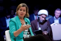 FILE - Kelly Clements, UNHCR Deputy High Commissioner, speaks during a session at the World Economic Forum on the Middle East and North Africa at the King Hussein Convention Center at the Dead Sea, May 20, 2017.
