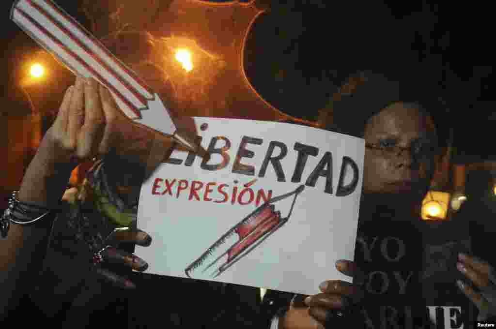 Jornalistas participam numa manifestação pela liberdade de expressão no Parque Duarte em Santo Domingo, República Dominicana. Jan 8, 2015.