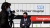 Journalists work outside St Thomas' Hospital in central London as British Prime Minister Boris Johnson was moved to intensive care after his coronavirus symptoms worsened in London, Tuesday, April 7, 2020. Johnson was admitted to St Thomas' hospital…