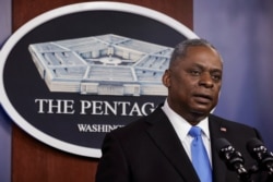 U.S. Defense Secretary Lloyd Austin speaks to Defense Department personnel at the Pentagon in Arlington, Virginia, Feb. 10, 2021.