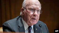 FILE — Sen. Patrick Leahy, D-Vt., questions FBI Director Christopher Wray as he testifies before the Senate Appropriations Subcommittee on Commerce, Justice, Science, and Related Agencies on Capitol Hill in Washington, June 23, 2021. 