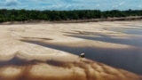 Aerial view of a sandbank on the bed of the Negro River, in the Anavilhanas Archipelago, in Novo Airao, Amazonas state, northern Brazil, Oct. 1, 2024. 