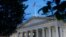 FILE - The US Treasury Department building is seen at dusk in Washington, June 6, 2019. 