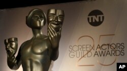 FILE - A Screen Actors Guild statue appears on stage at the nominations announcement for the 25th annual Screen Actors Guild Awards at the Pacific Design Center on Dec. 12, 2018, in West Hollywood, Calif. 