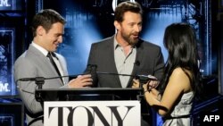NEW YORK, NY (L-R) Actors Jonathan Groff, Hugh Jackman and Lucy Liu speak onstage at the 2014 Tony Awards Nominations Ceremony at the Diamond Horseshoe at the Paramount Hotel, April 29, 2014 in New York City.