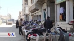 Aborîya Xirab Berê Reqayîyan Dide Bazara Kincên Karhatî