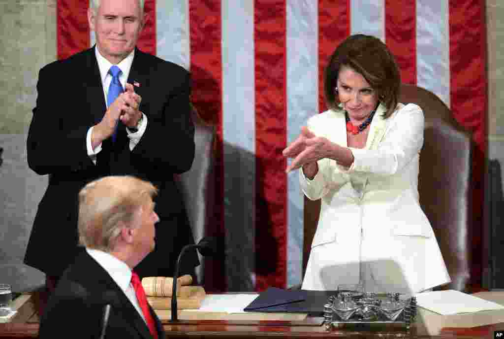 President Donald Trump arrives to deliver the State of the Union address, with Vice President Mike Pence and Speaker of the House Nancy Pelosi, at the Capitol in Washington, D.C., Feb. 5, 2019.