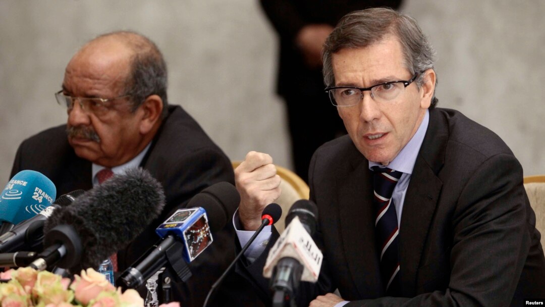Bernardino Leon, right, the U.N. special envoy for a Libya, addresses Libyan political leaders and rivals in Algiers Tuesday. At left is Algeria's Minister of African and Maghreb Affairs, Abdelkader Messahel, March 10, 2015. 