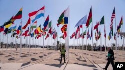 File - A member of the security forces stands guard outside a convention center hosting the IMF and World Bank annual meetings, in Marrakech, Morocco, Oct. 9, 2023. Some leaders suggested the meetings should discuss Africa's ability to handle climate shocks.