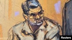 Former Honduran President Juan Orlando Hernandez attends his sentencing before U.S. District Judge Kevin Castel on drug trafficking charges in federal court in New York on June 26, 2024, in this courtroom sketch.