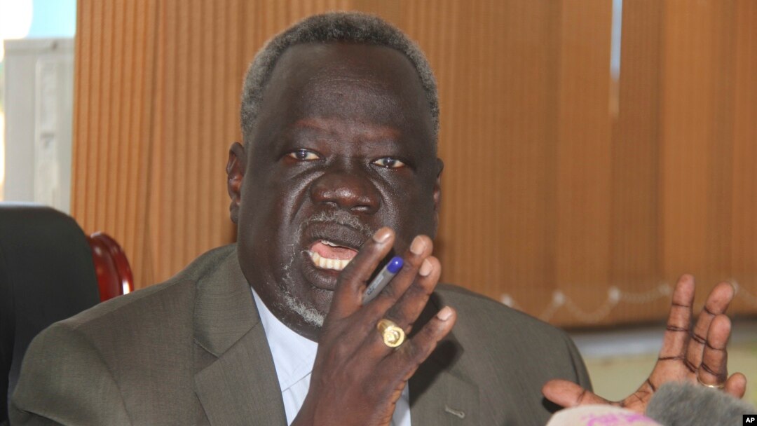 South Sudan Minister of Health Dr. Riek Gai Kok speaks during a press conference in Juba, South Sudan, June 2, 2017. South Sudan's government says 15 young children have died in a botched measles vaccination campaign that saw people as young as 12 years 