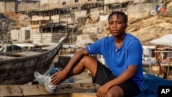 Ghana's first-ever female world boxing champion, Abigail Kwartekaa Quartey, poses for a photo after a morning training session on the beach in the Jamestown district of Accra, Jan 22, 2025.