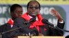 FILE: Zimbabwe President Robert Mugabe addresses people gathered for his 91st birthday celebration in Victoria Falls, Feb. 28, 2015. 