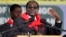 FILE: Zimbabwe President Robert Mugabe addresses people gathered for his 91st birthday celebration in Victoria Falls, Feb. 28, 2015. 