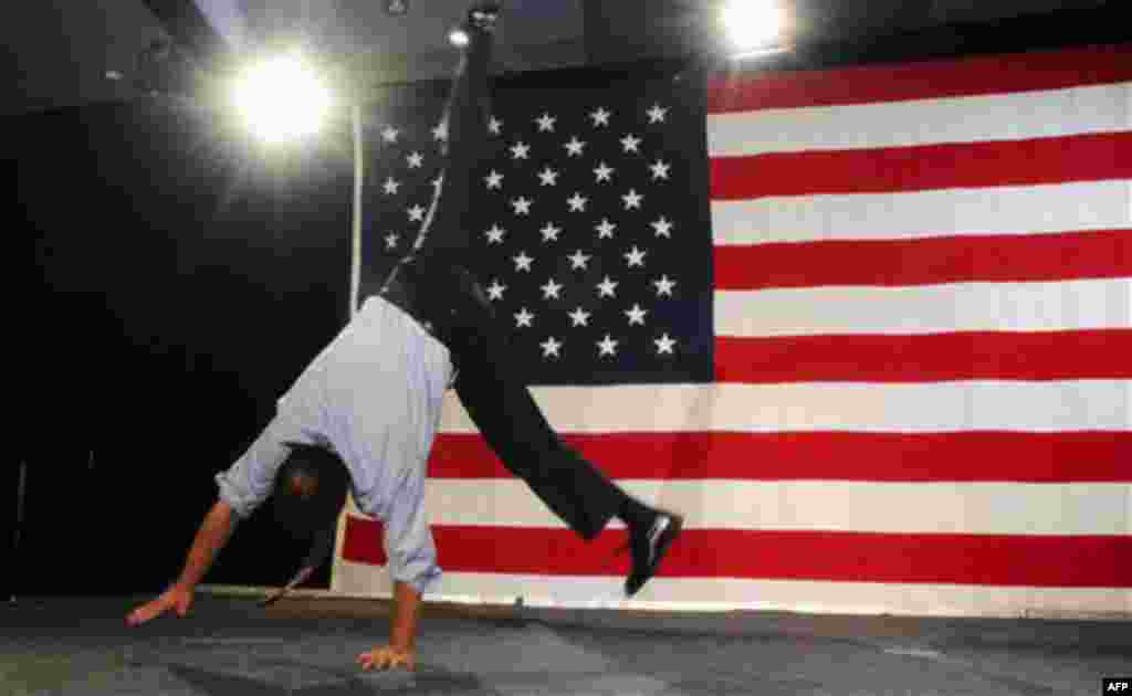 Rep. Ed Perlmutter, D-Colo., does a cartwheel at a post-election party in Denver on Tuesday, Nov. 2, 2010 after he was re-elected to his 7th district seat. (AP Photo/Chris Schneider)