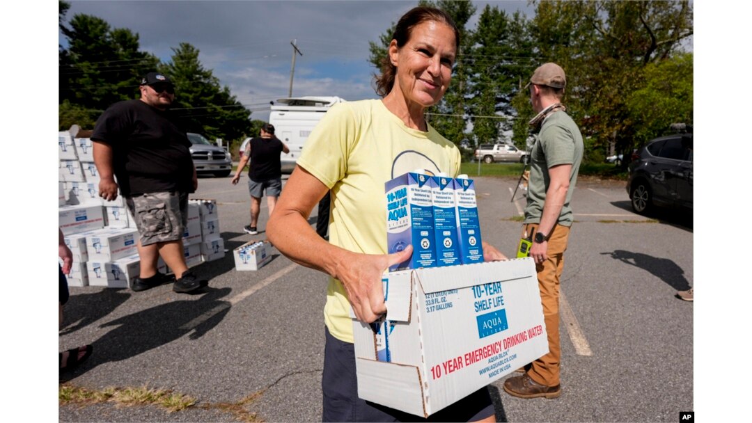 Volunteers stage water for citizens in the aftermath of Hurricane Helene, Sept. 30, 2024, in Asheville, NC.