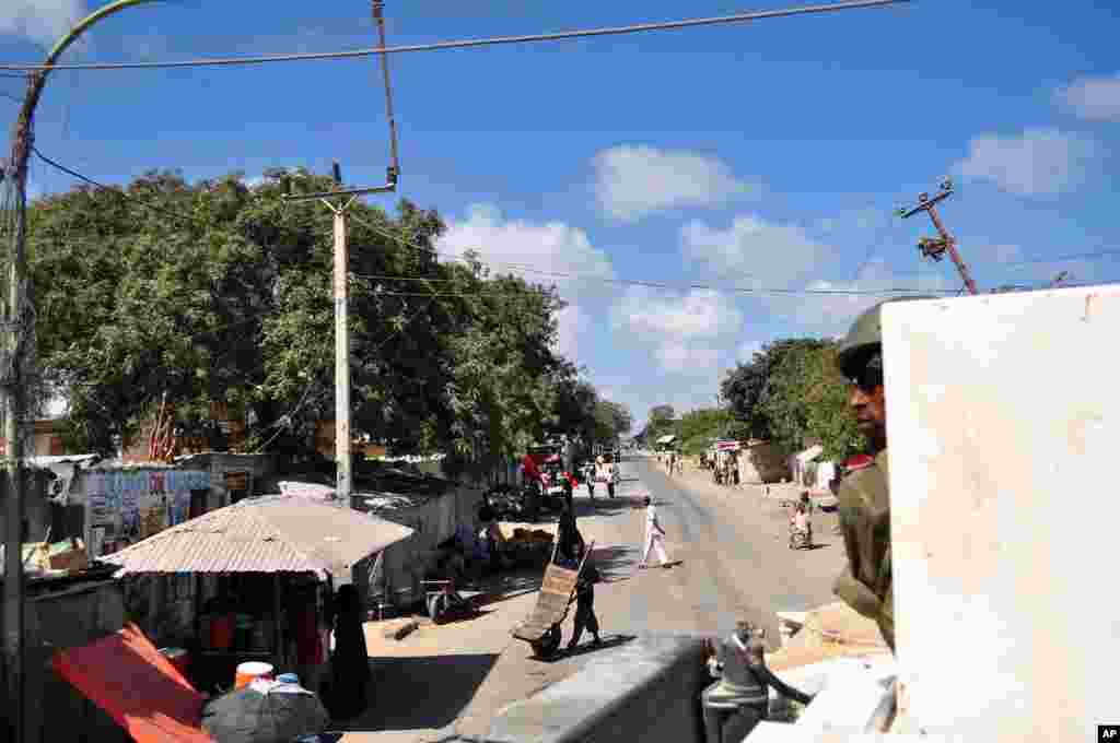 A Burundian soldier surveys the streets of Mogadishu. The city has been relatively quite since September after AMISOM forces repelled an attempt takeover by insurgent group al-Shabab.
