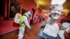A worker sprays disinfectant as sanitization operations against Coronavirus are carried out in the museum hosted by the Maschio Angioino medieval castle, in Naples, Italy, March 10, 2020. 
