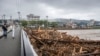 Debris from floodwaters is seen stuck by a bridge following heavy rain in Wajima city, Ishikawa prefecture, Japan, on Sept. 22, 2024.