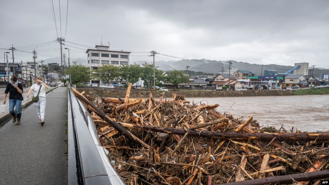 Rescue workers search for at least 6 people missing after Japan
