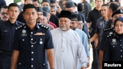 CEO of Global Ikhwan Services and Business Holdings (GISB) Nasiruddin Mohd Ali arrives at Selayang court to face charges at the court, in Selayang, Malaysia October 23, 2024. 