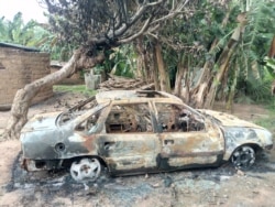 FILE - A burned car in Kurmin Masara village in Kaduna after gunmen attacked the village Aug. 6, 2020, killing tens of people. (Timothy Obiezu/VOA)
