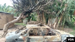 A burned car in Kurmin Masara village in Kaduna after gunmen attacked the village Aug. 6, 2020, killing tens of people. (Timothy Obiezu/VOA)