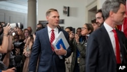 House Ethics Committee Chairman Representative Michael Guest, center, arrives for a meeting of the House Ethics Committee, on Capitol Hill in Washington, Nov. 20, 2024.