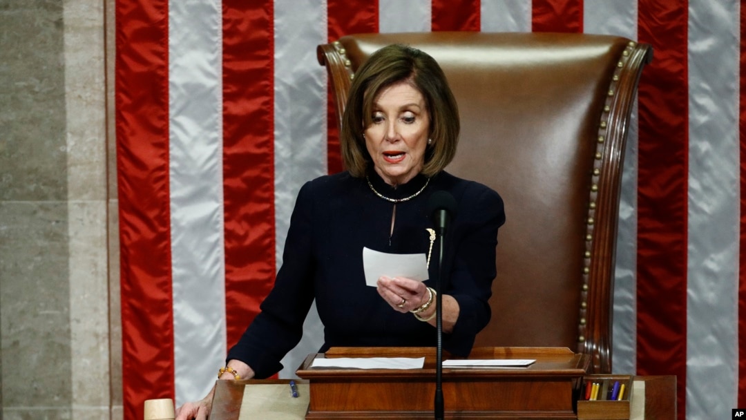 House Speaker Nancy Pelosi of Calif., readies to strike the gavel as she announces the passage of article II of impeachment against President Donald Trump, Dec. 18, 2019, on Capitol Hill in Washington.