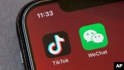 TikTok （抖音國際版）和微信（WeChat) 標誌。