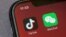 TikTok （抖音国际版）和微信（WeChat) 标志。