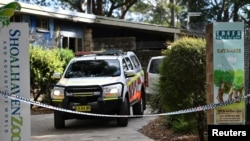 An ambulance is seen leaving the Shoalhaven Zoo, where a worker was wounded in a lion attack, in Nowra, Australia, May, 29, 2020.
