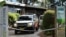An ambulance is seen leaving the Shoalhaven Zoo, where a worker was wounded in a lion attack, in Nowra, Australia, May, 29, 2020.