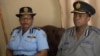 Zimbabwe police spokesperson, Charity Charamba (left), and Erasmus Makodza, the head of the new election command within Zimbabwe’s police force (right), speaking to reporters in Harare, Apr. 23, 2018. 